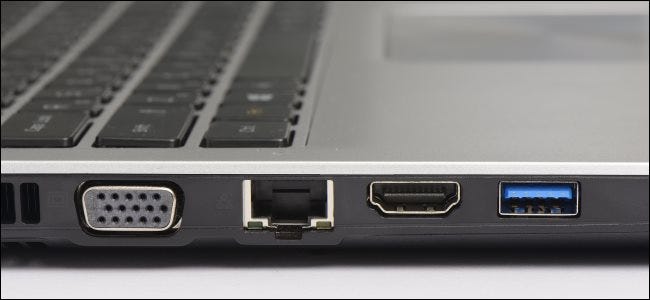 USB 3.0, Ethernet, and graphics ports on a laptop computer.