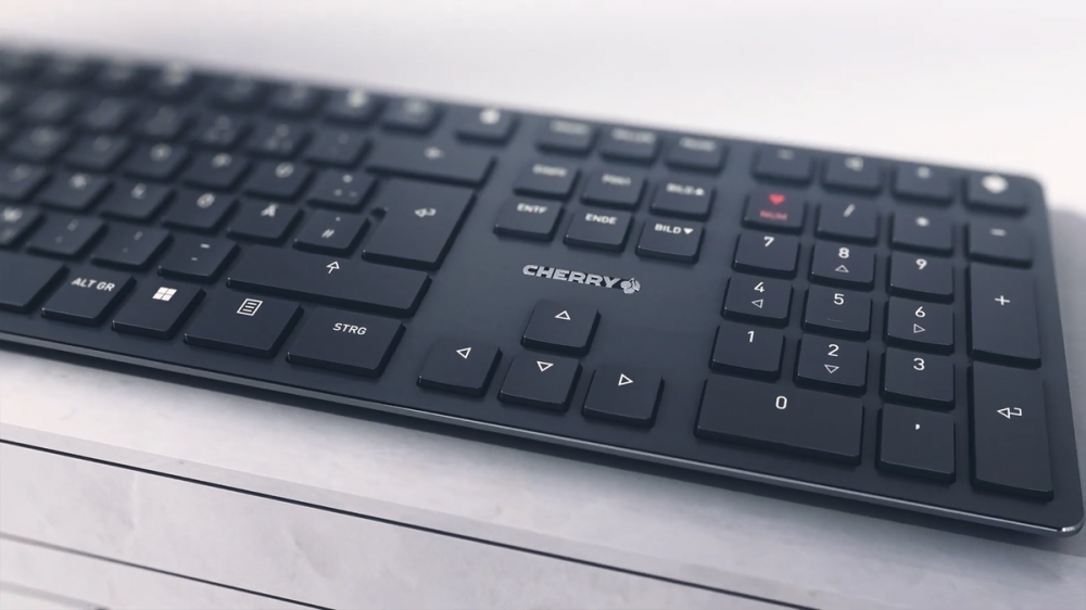 The Cherry KW X ULP mechanical keyboard on a table.